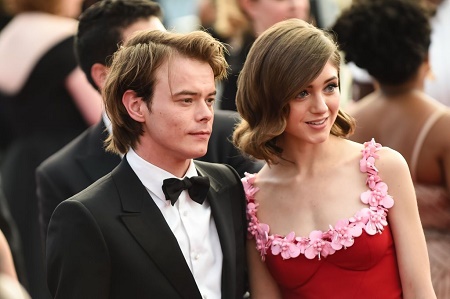 Charlie Heaton and his girlfriend, Natalia Dyer, during an event.